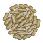 Arranged greenish capsules in a neat, circular pattern, evoking natural wellness and dietary supplements.