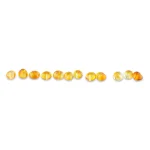 Line of polished Baltic amber beads in warm honey and amber tones.