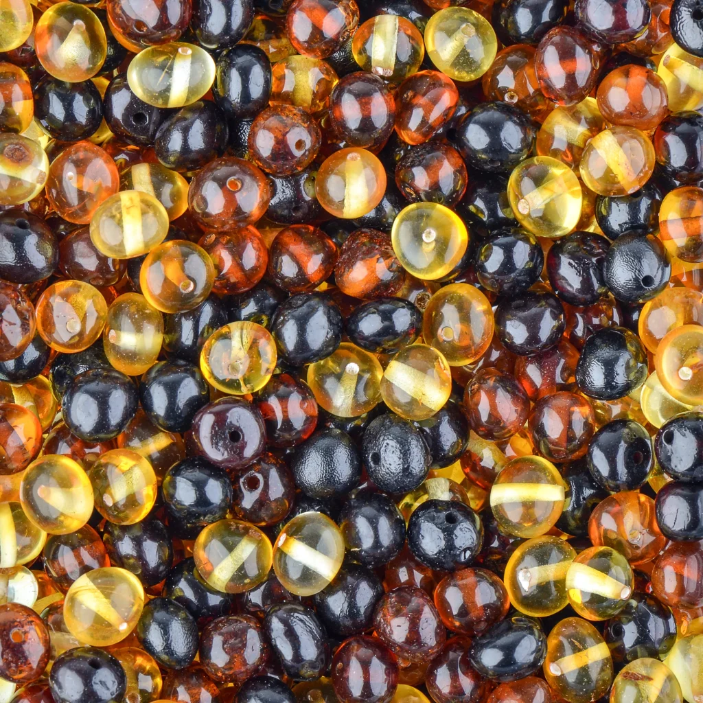 Vibrant multicolor glossy amber and black beads for elegant jewelry and handcrafted accessories.