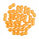 Array of shiny orange oval beads arranged in a circular pattern on a white background.