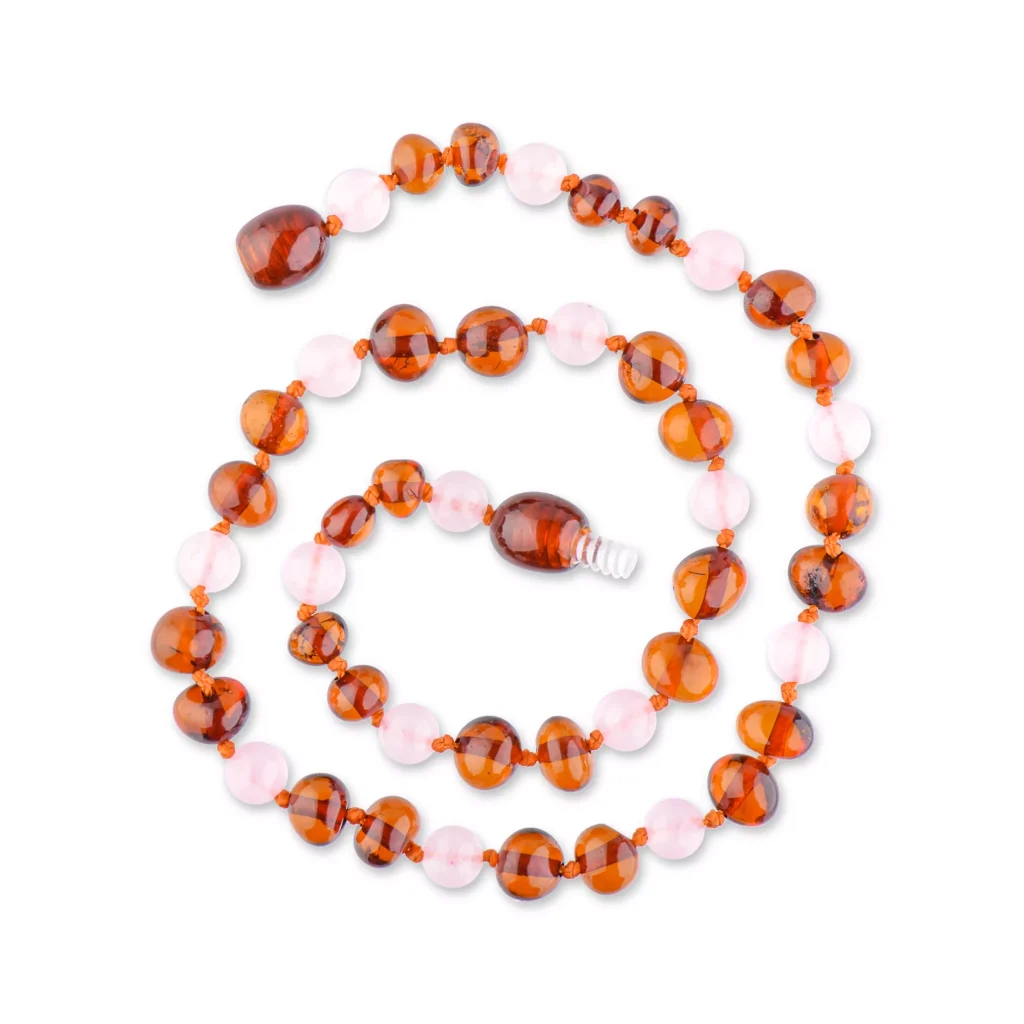 Polished teething amber necklace cognac color with rose quartz