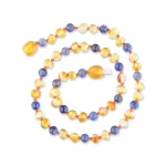 Polished teething amber necklace honey color with sodalite