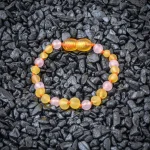 Unpolished teething amber bracelet lemon color with rose quartz