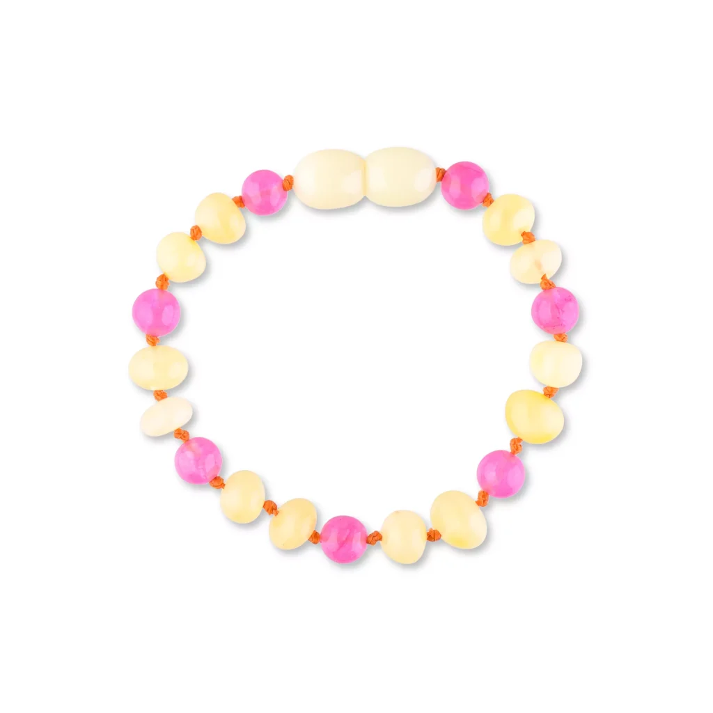 Colorful pink and yellow beaded bracelet with playful oval and round shapes for a fun accessory.