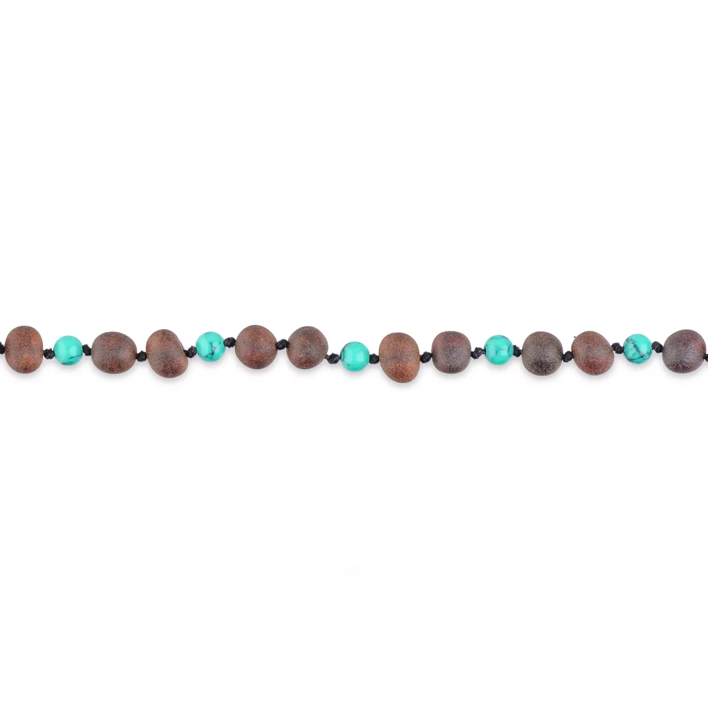 Wood and turquoise beaded necklace with black spacers for casual and elegant wear.
