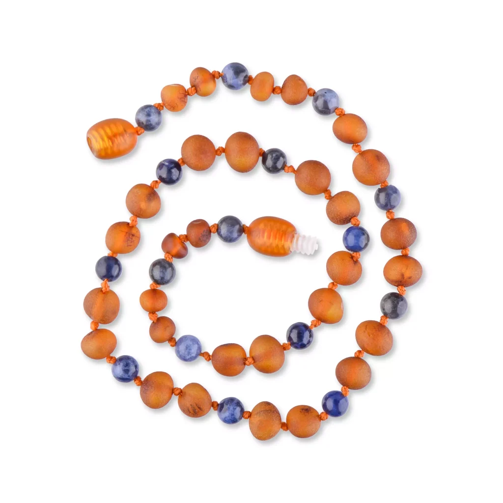 Handmade Baltic amber necklace with blue beads, natural warm cognac hues, and artisanal craftsmanship.