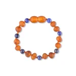 Colorful beaded bracelet with orange matte and glossy blue accents, handmade and elastic.