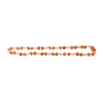 Handmade Baltic amber necklace with pink accents and polished, organic-shaped beads.
