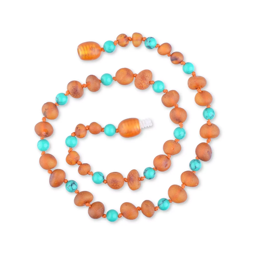 Handcrafted Baltic amber and turquoise necklace with warm tones and vibrant accents.