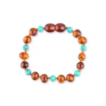 Elegant Baltic amber and turquoise bracelet with natural, handcrafted beauty and vibrant contrasting colors.
