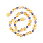 Vibrant amber and deep blue beaded necklace with polished, elegant craftsmanship and versatile style.