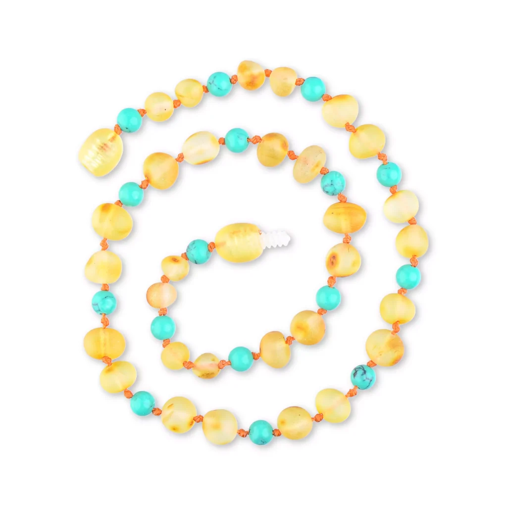 Beautiful amber and turquoise beaded necklace with natural, warm, and vibrant stone accents.