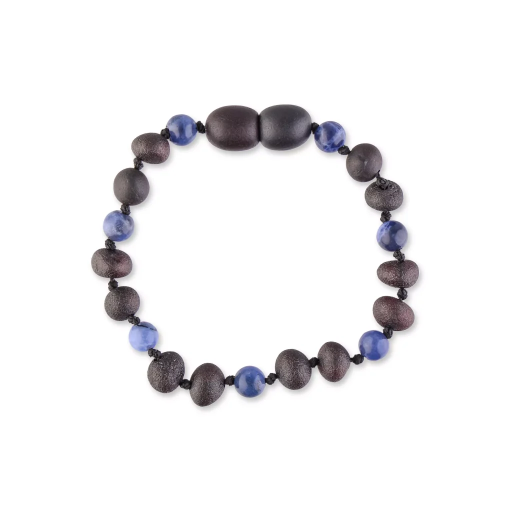Handmade dark-tone beaded bracelet with blue accents, elegant and versatile for any occasion.