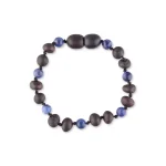 Handmade dark-tone beaded bracelet with blue accents, elegant and versatile for any occasion.