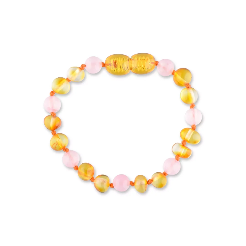 Colorful beaded bracelet with pink and yellow tones, crafted with polished, translucent beads.