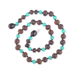 Handmade wooden and turquoise prayer beads necklace for meditation and spiritual connection.