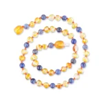 Colorful Baltic amber necklace with blue and yellow beads and elegant teardrop accents.