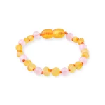 Pastel beaded bracelet with pink and yellow circular and faceted beads, elastic stretch.