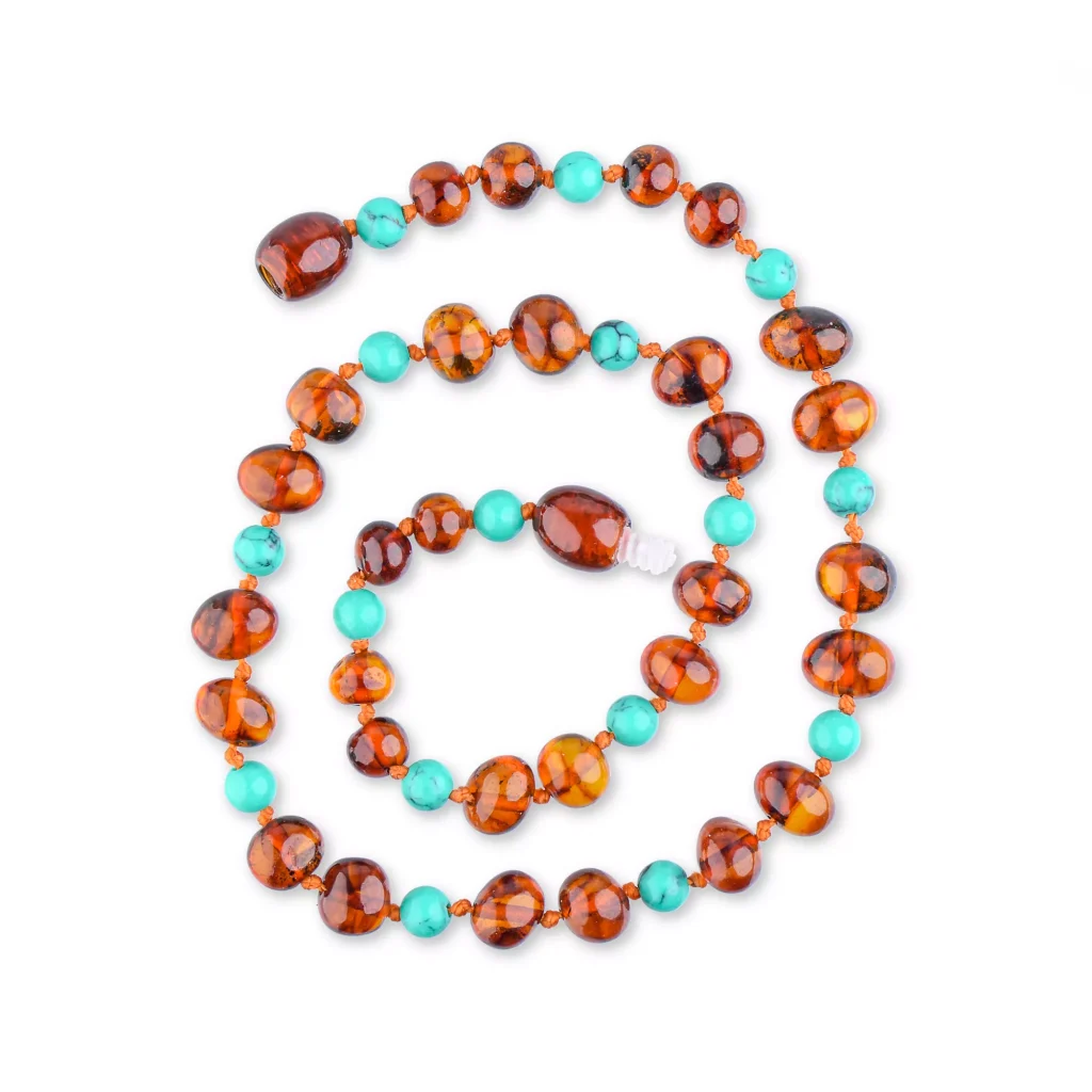 Elegant Baltic amber and turquoise necklace with polished amber beads and vibrant blue-green accents.