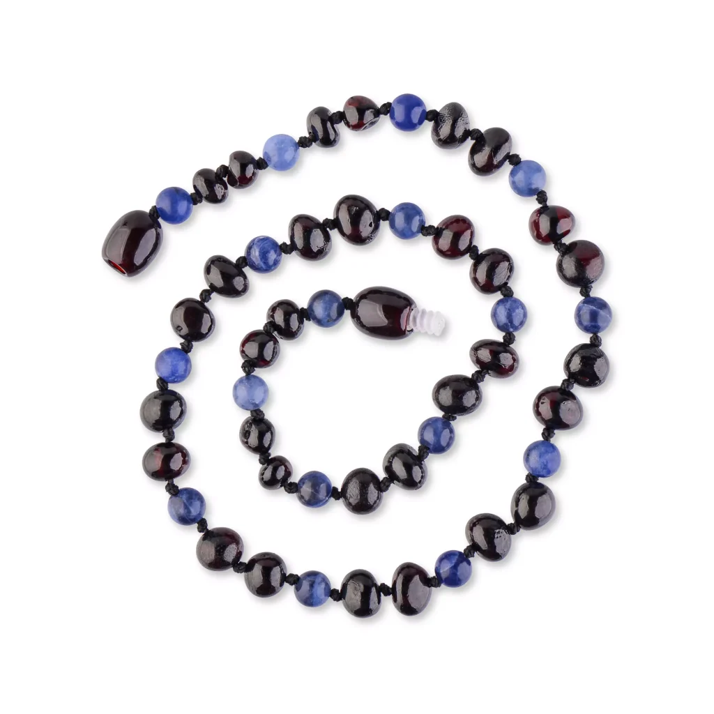 Elegant black and blue beaded necklace with polished glass and semi-precious accents.