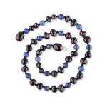 Elegant black and blue beaded necklace with polished glass and semi-precious accents.