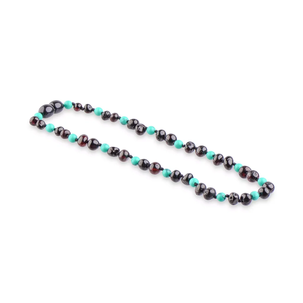 Elegant black and turquoise beaded necklace handcrafted with polished stones and vibrant accents.