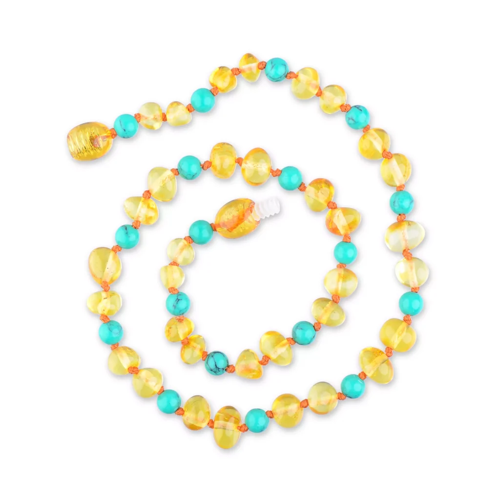Vibrant handmade Baltic amber and turquoise necklace with colorful, glossy bead design.