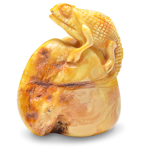 Genuine amber lizard carving