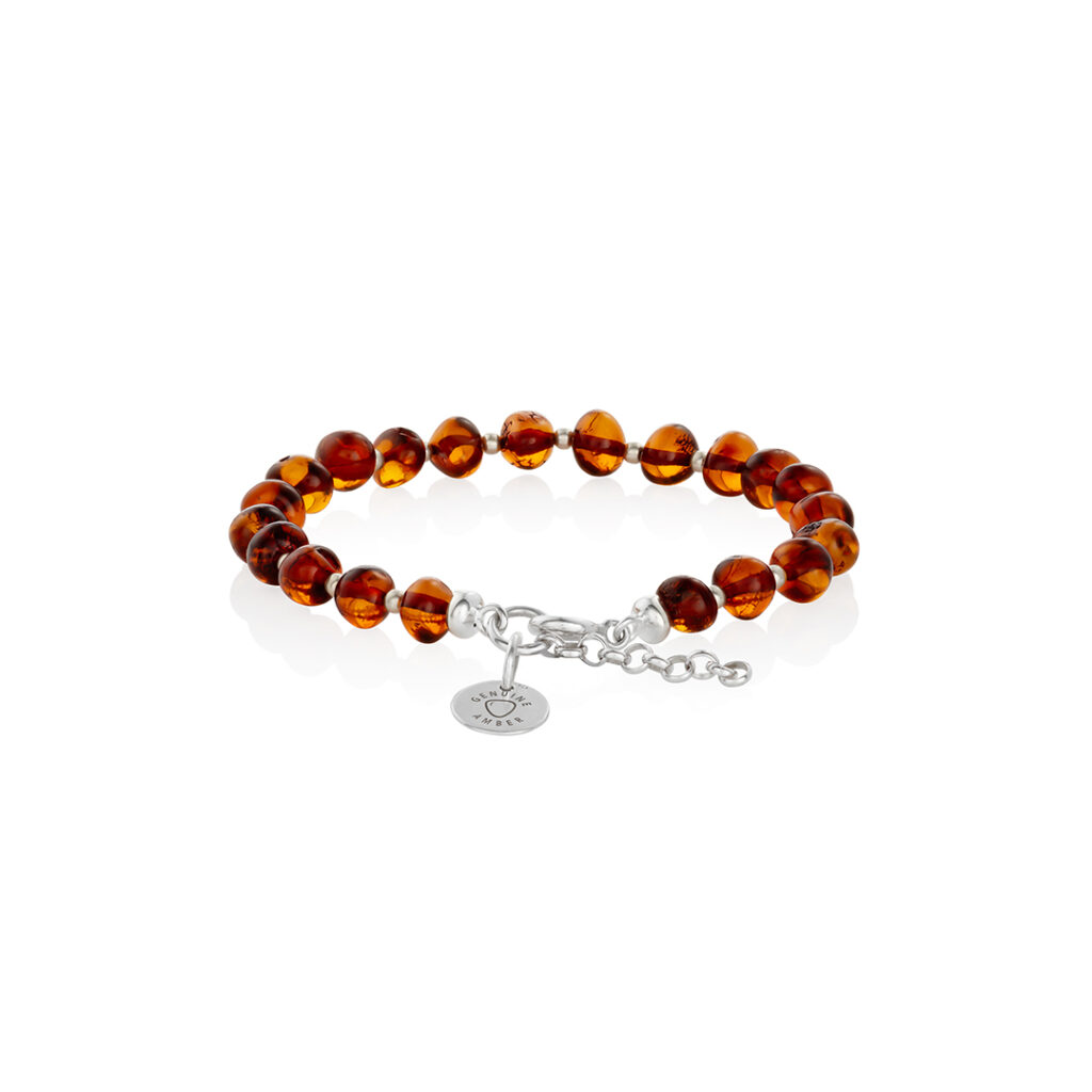 Natural Baltic amber bracelet cognac color with sterling silver accents and logo, baroque, polished