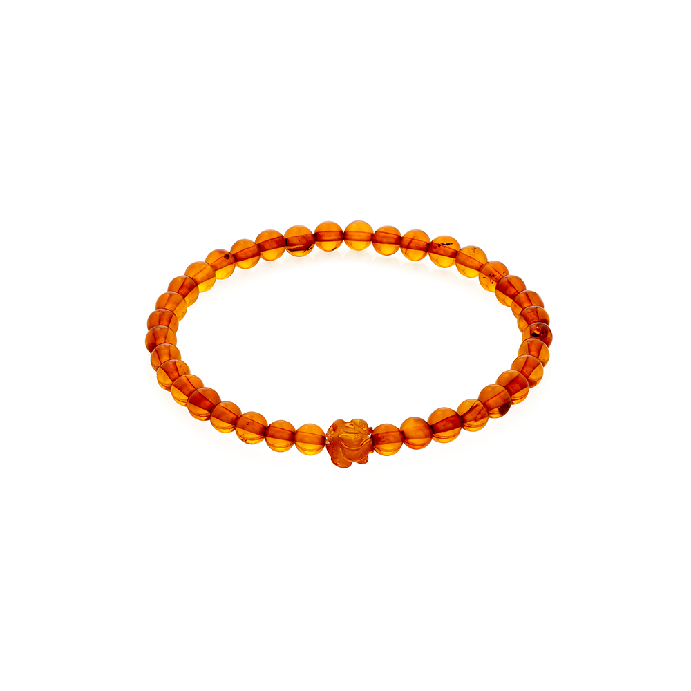 stylish polished light cognac color sphere natural amber bracelet with a rose, hand crafted