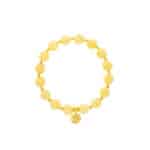 Bright yellow beaded bracelet with gold accents and a central engraved charm, elegant and cheerful.
