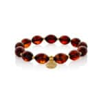 Amber bead bracelet with gold spacers, elegant, versatile, perfect for everyday or special occasions.