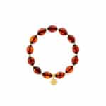 Elegant amber beaded bracelet with gold accents and a decorative gold charm.