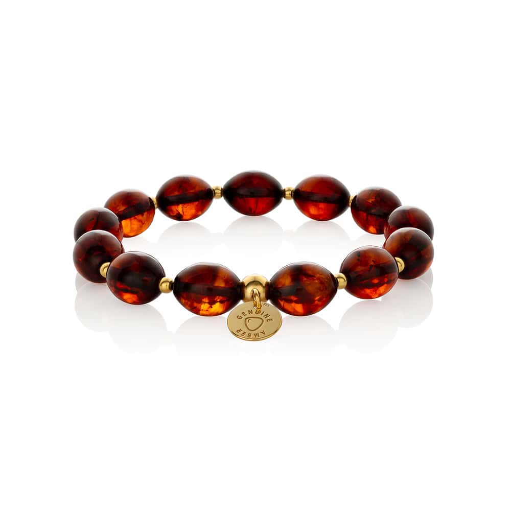 Amber bead bracelet with gold spacers, elegant, versatile, perfect for everyday or special occasions.