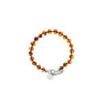 Handmade amber beaded bracelet with silver charm and adjustable chain for elegant natural style.