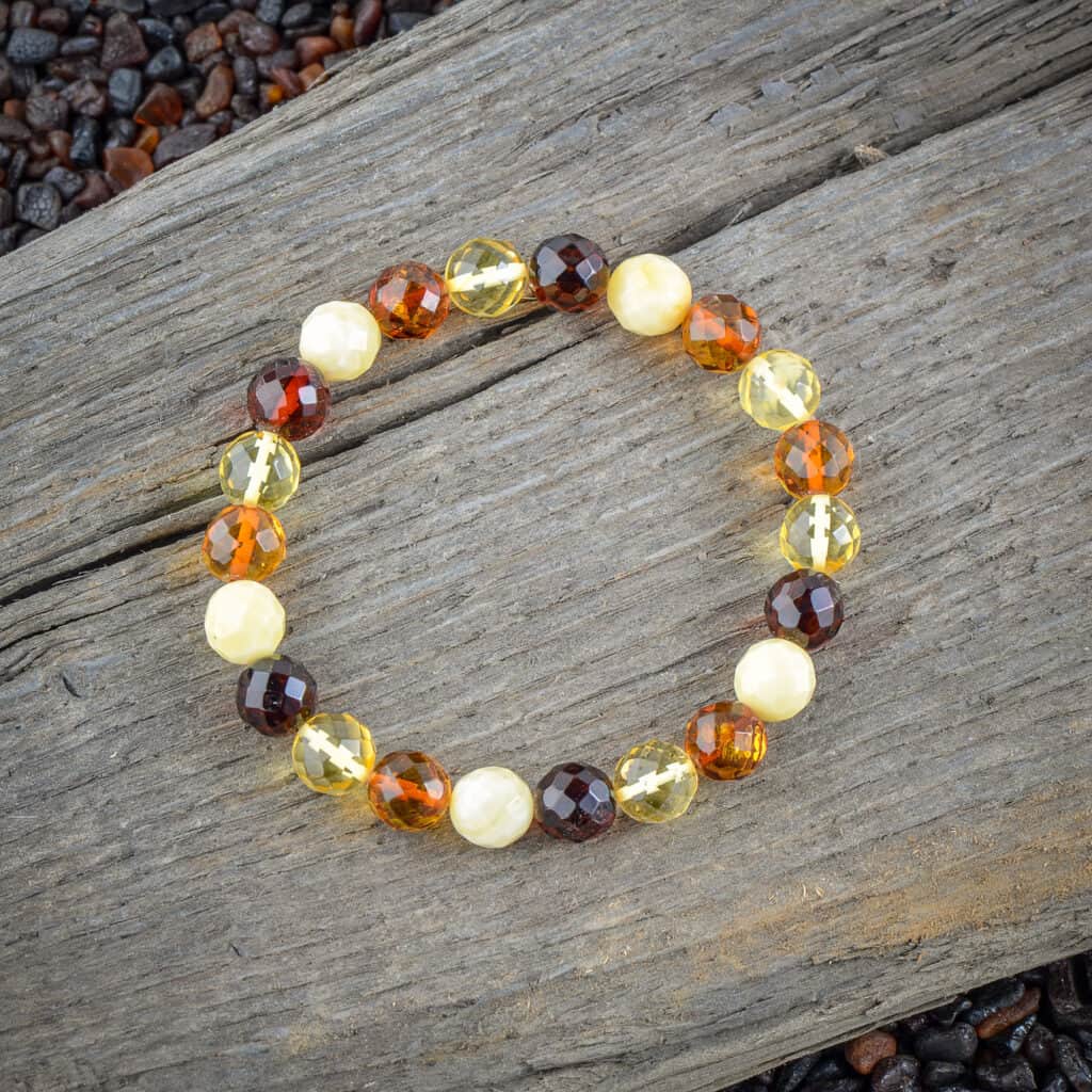 Handmade Baltic amber beaded bracelet with warm earthy tones and varied textures.