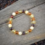 Handmade Baltic amber beaded bracelet with warm earthy tones and varied textures.