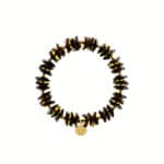 Handmade black and amber gemstone bracelet with charm, versatile and elegant jewelry accessory.