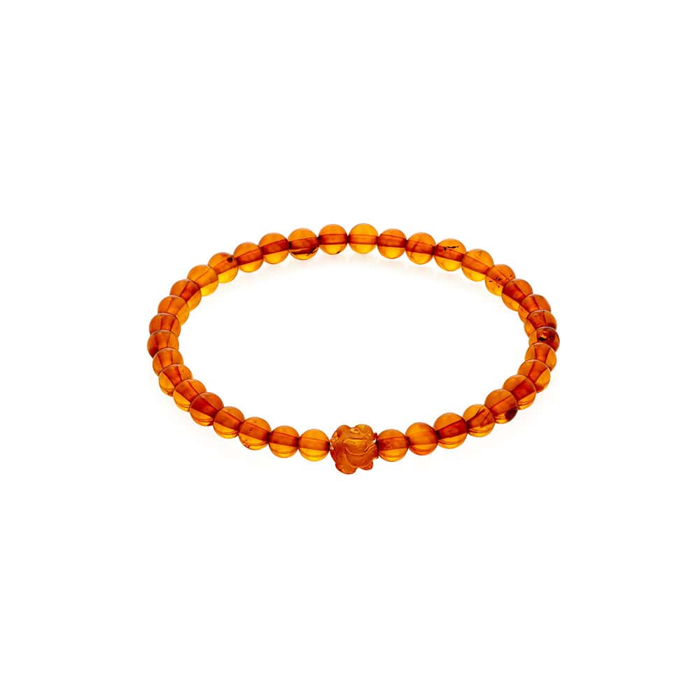 Elegant amber bead bracelet with polished, natural cognac tones for versatile, stylish wear.