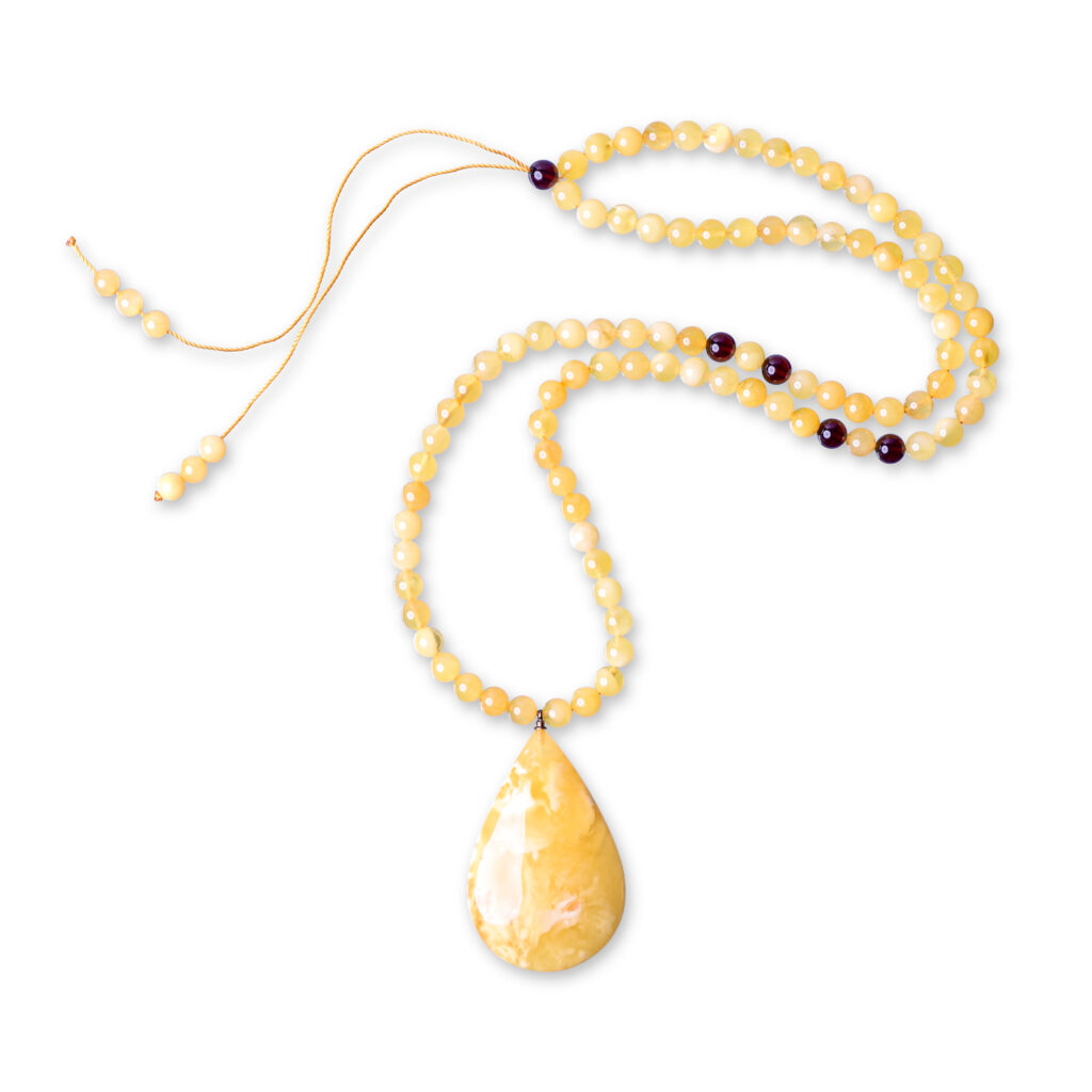 Baltic amber necklace, butter colors, with several red amber beads, with an exquisite pendant