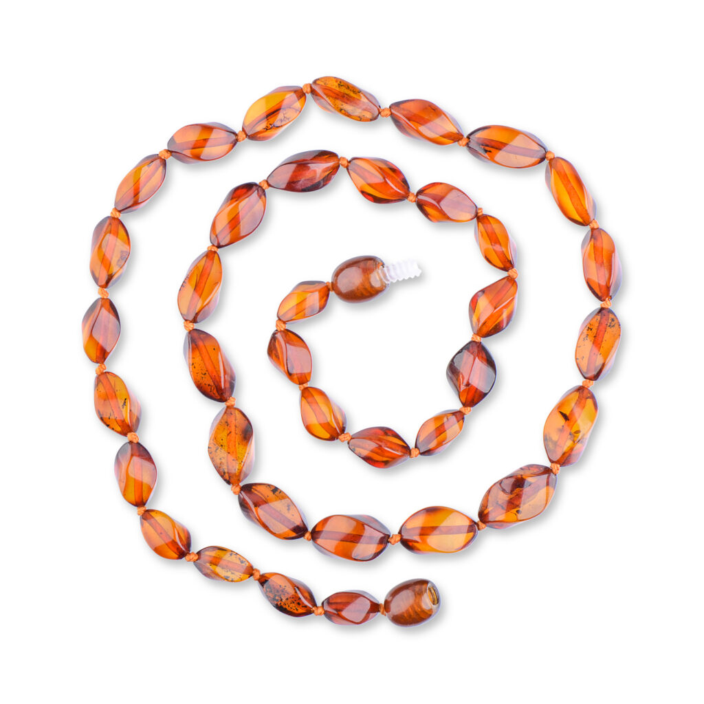 Baltic amber necklace with curved beads, shining cognac-colored