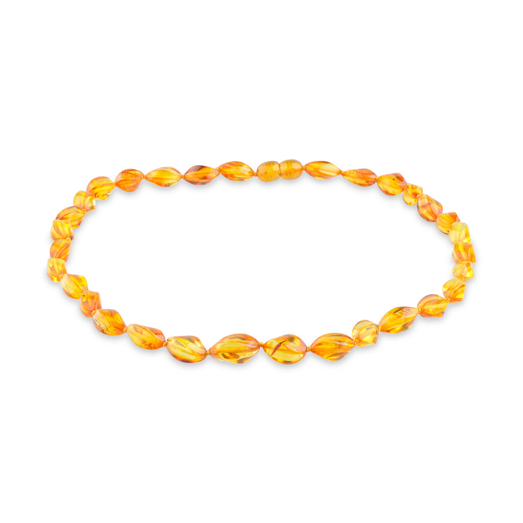 A collection of genuine amber necklaces, featuring beads in various shades from deep honey to creamy butter. Each necklace showcases the natural beauty of amber, with smooth, polished beads that highlight unique inclusions and subtle color variations. The necklaces are elegantly crafted, offering a timeless and organic accessory choice.