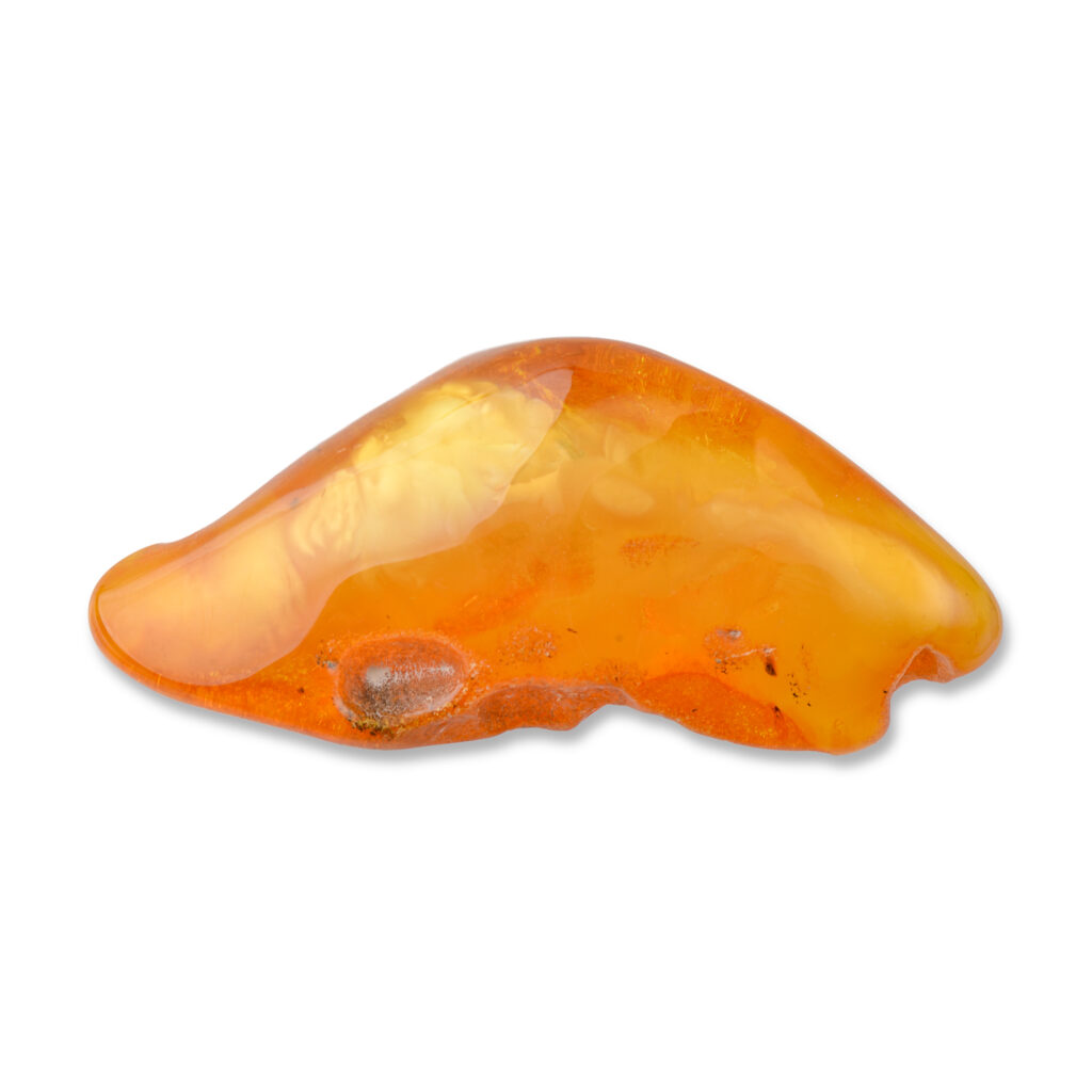 A detailed view of the amber’s surface texture, highlighting natural ridges and the unique patterns within the resin.