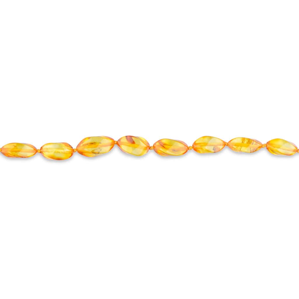 Elegant amber bead strand with honey tones and natural variations for timeless jewelry.