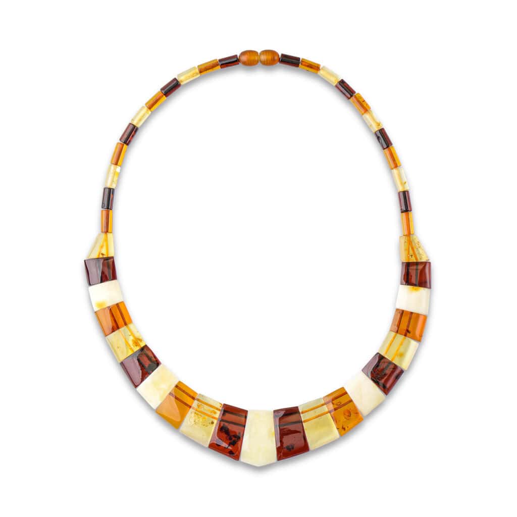 Elegant Baltic amber necklace with alternating rectangular and cylindrical beads in warm earth tones.