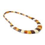 Colorful handcrafted amber necklace with warm beads, elegant design, perfect for any occasion.