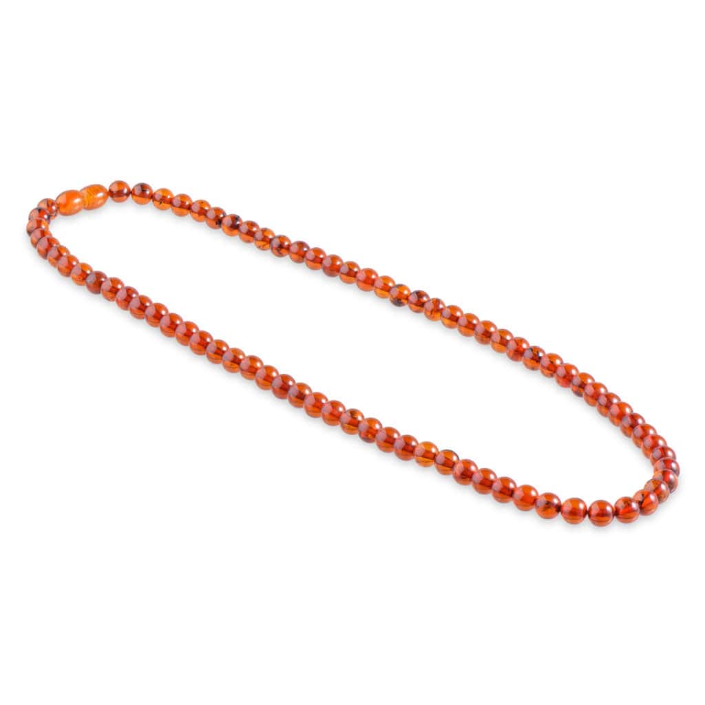 Handmade Baltic amber necklace with warm golden cognac beads, elegant and natural jewelry accessory.