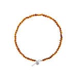 Elegant Baltic amber necklace with silver clasp, minimalist design, perfect for everyday or special occasions.