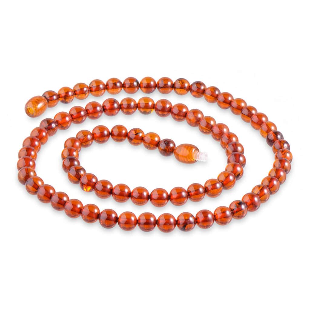 Beautiful amber necklace with warm cognac beads, handcrafted for timeless elegance and natural charm.