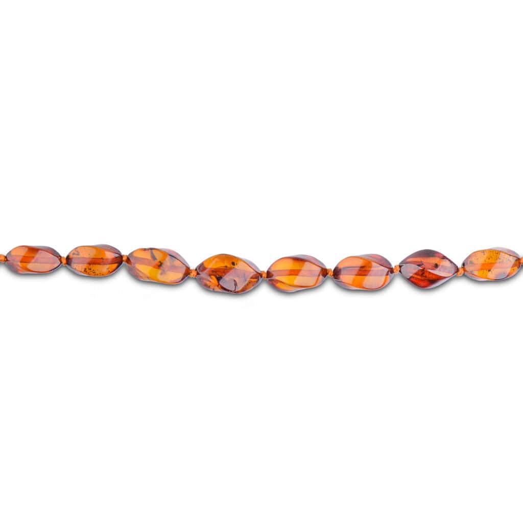 Elegant amber bead necklace showcasing natural honey hues and unique internal inclusions.